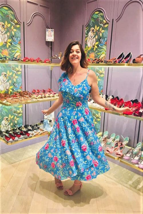 Joe Browns staff member wearing blue floral dress