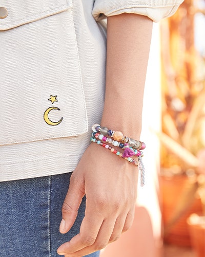 Jeans paired with bracelets