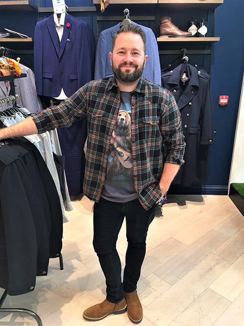 Joe Browns Meadowhall store manager wearing men's check shirt