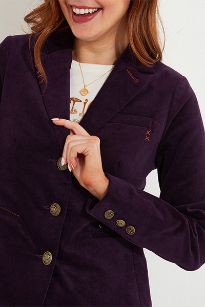 Style a graphic t-shirt with a blazer