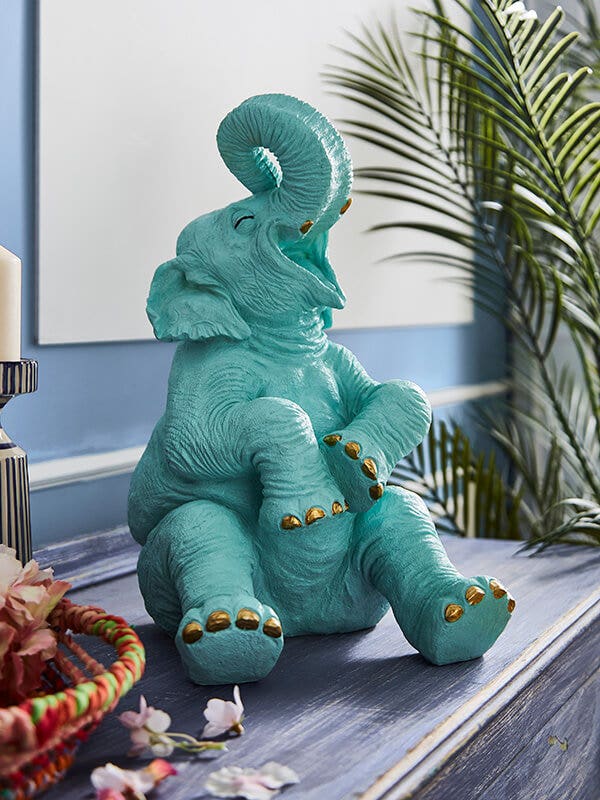 ENCHANTING LAUGHING ELEPHANT FIGURE